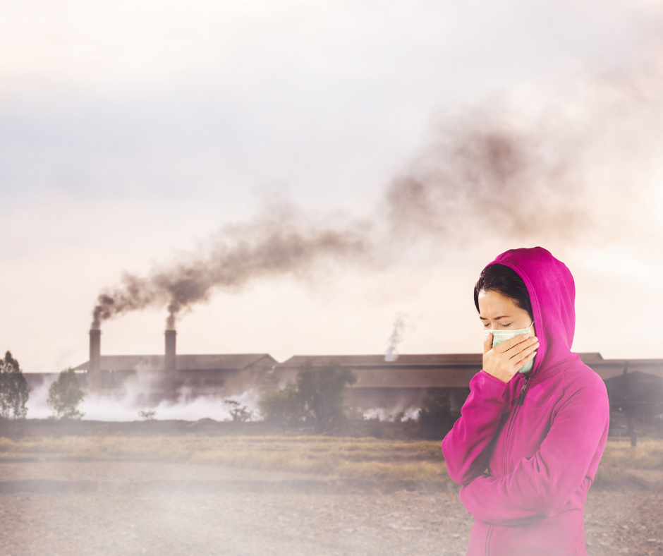 Girl breathing polluted air.